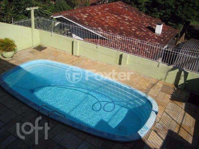 Casa com 4 quartos à venda na Rua Júlio Adams, 146, Guarani, Novo Hamburgo, 205 m2 por R$ 499.500