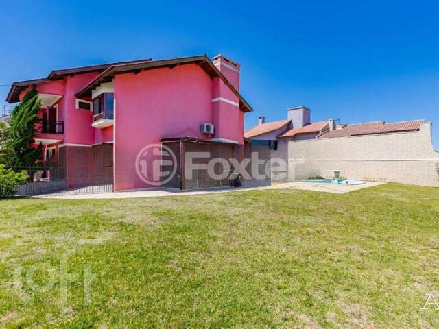 Casa com 3 quartos à venda na Rua Bélgica, 26, Marechal Rondon, Canoas, 270 m2 por R$ 2.100.000