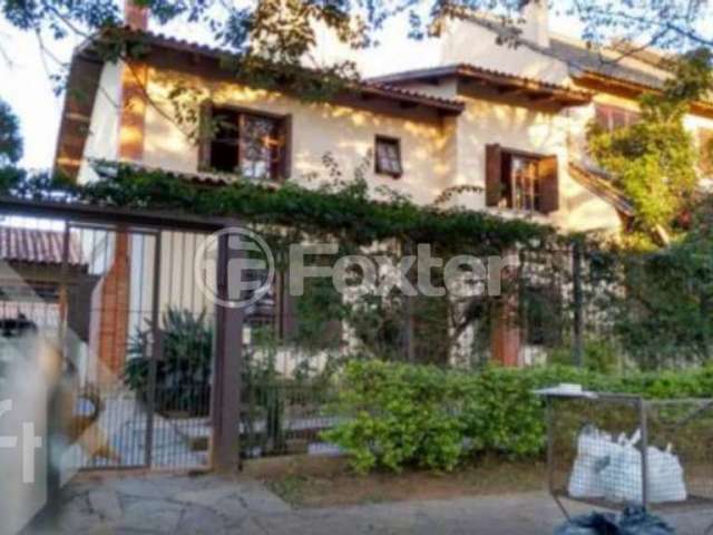 Casa com 5 quartos à venda na Rua Henrique Scliar, 142, Jardim Itu Sabará, Porto Alegre, 262 m2 por R$ 1.490.000