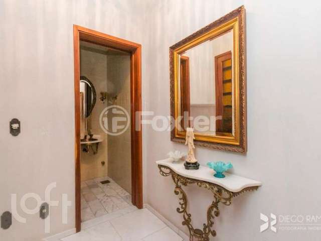 Casa com 5 quartos à venda na Rua Tomaz Edison, 416, Santo Antônio, Porto Alegre, 592 m2 por R$ 950.000