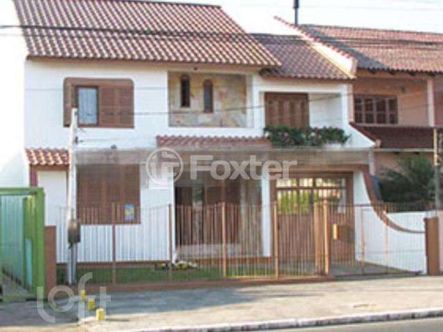 Casa com 3 quartos à venda na Beco Rui Barbosa, 469, Fátima, Canoas, 196 m2 por R$ 940.000