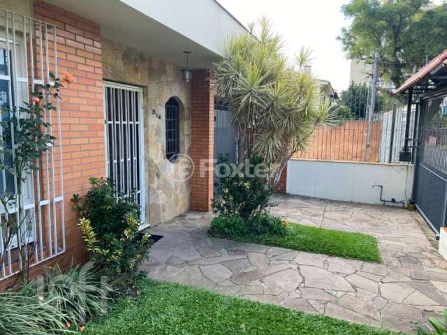 Casa com 3 quartos à venda na Rua Fátima, 314, Partenon, Porto Alegre, 289 m2 por R$ 900.000