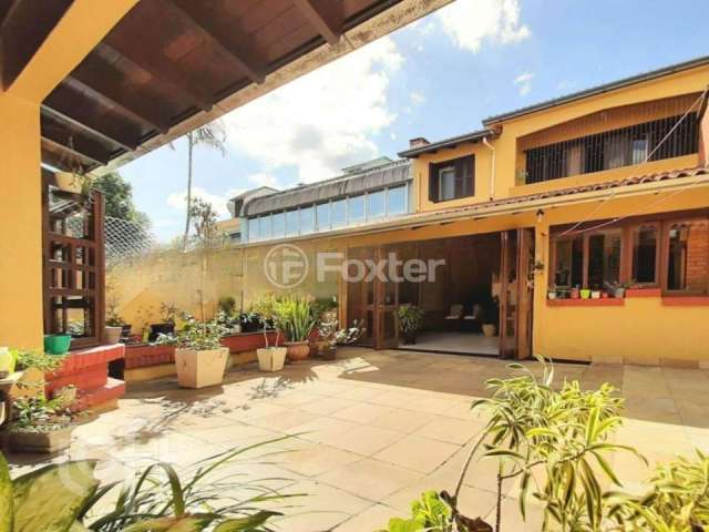 Casa com 5 quartos à venda na Rua Professor Guerreiro Lima, 425, Partenon, Porto Alegre, 280 m2 por R$ 850.000