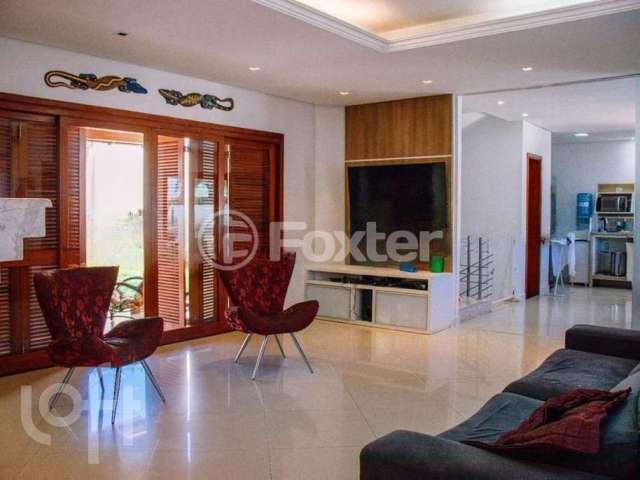 Casa com 3 quartos à venda na Rua País de Gales, 504, Marechal Rondon, Canoas, 204 m2 por R$ 1.590.000