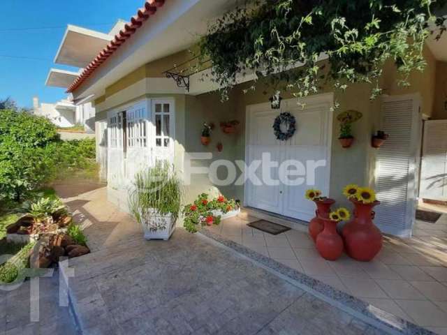 Casa com 5 quartos à venda na Rua País de Gales, 41, Marechal Rondon, Canoas, 333 m2 por R$ 2.500.000