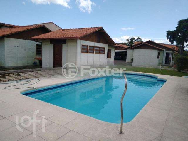 Casa com 5 quartos à venda na Rua Oiampi, 271, Guarujá, Porto Alegre, 180 m2 por R$ 1.200.000