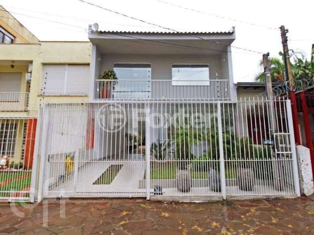 Casa com 3 quartos à venda na Rua Teixeira de Freitas, 558, Santo Antônio, Porto Alegre, 138 m2 por R$ 1.109.000