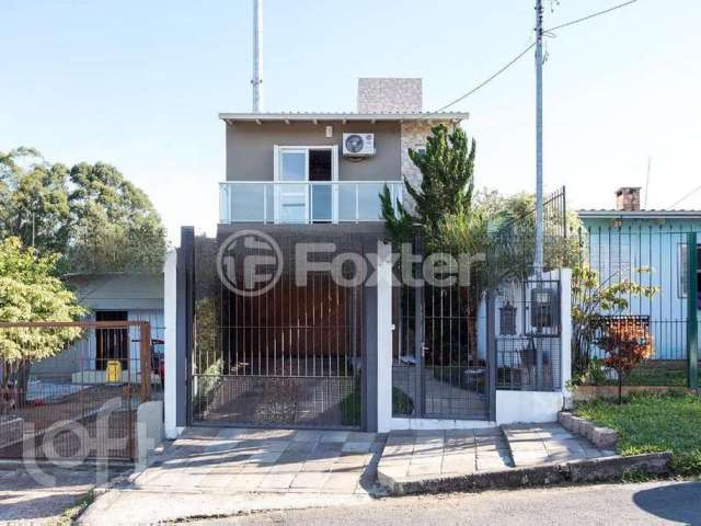 Casa com 4 quartos à venda na Acesso Nelson Silva, 39, Vila Nova, Porto Alegre, 170 m2 por R$ 450.000