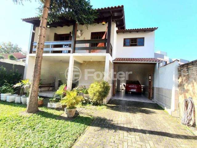 Casa com 5 quartos à venda na Avenida Coronel Marcos, 2124, Pedra Redonda, Porto Alegre, 150 m2 por R$ 1.300.000