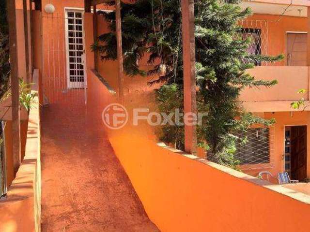 Casa com 4 quartos à venda na Avenida Vicente Monteggia, 283, Cavalhada, Porto Alegre, 200 m2 por R$ 640.000