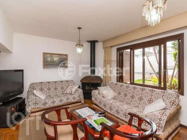 Casa com 3 quartos à venda na Travessa Ieda, 3, Santa Tereza, Porto Alegre, 270 m2 por R$ 618.000