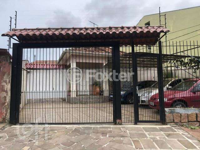 Casa com 5 quartos à venda na Rua Afonso Arinos, 909, Camaquã, Porto Alegre, 350 m2 por R$ 664.000