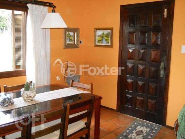 Casa com 3 quartos à venda na Estrada Kanazawa, 1223, Vila Nova, Porto Alegre, 243 m2 por R$ 600.000