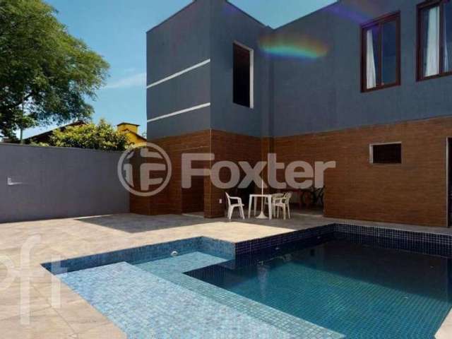 Casa com 4 quartos à venda na Rua Jacundá, 132, Guarujá, Porto Alegre, 240 m2 por R$ 1.590.000