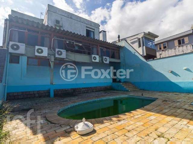 Casa com 3 quartos à venda na Rua Caeté, 1040, Vila Assunção, Porto Alegre, 678 m2 por R$ 1.700.000