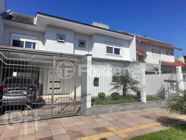 Casa com 4 quartos à venda na Rua Gardênia, 89, Estância Velha, Canoas, 250 m2 por R$ 1.600.000