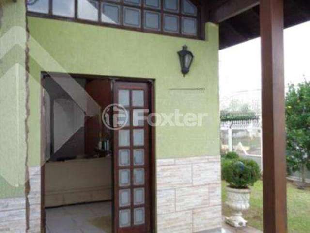 Casa com 3 quartos à venda na Rua Osvaldo Optiz, 298, Estância Velha, Canoas, 243 m2 por R$ 700.000