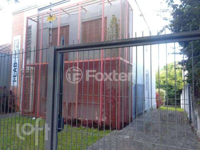 Casa com 5 quartos à venda na Rua Guilherme Schell, 176, Santo Antônio, Porto Alegre, 300 m2 por R$ 600.000