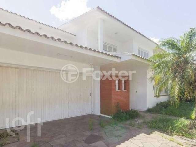 Casa com 4 quartos à venda na Rua Dona Adda Mascarenhas de Moraes, 141, Jardim Itu Sabará, Porto Alegre, 340 m2 por R$ 990.000