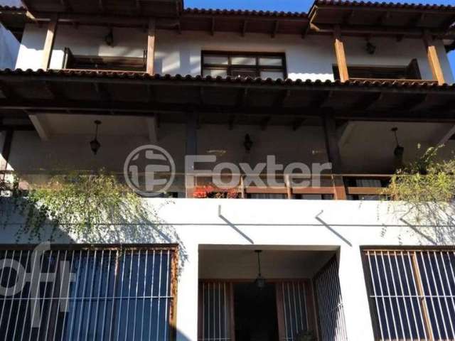 Casa com 4 quartos à venda na Rua Bororó, 225, Vila Assunção, Porto Alegre, 564 m2 por R$ 1.940.000