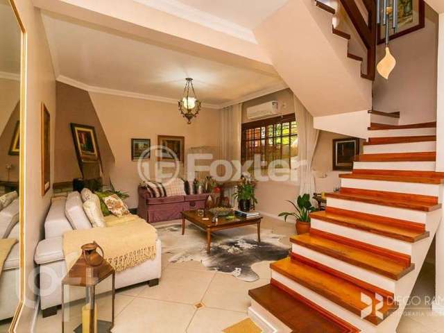 Casa com 3 quartos à venda na Rua Olécio Cavedini, 255, Espírito Santo, Porto Alegre, 159 m2 por R$ 901.000