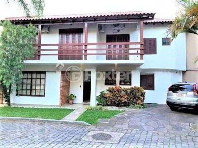 Casa em condomínio fechado com 3 quartos à venda na Rua Conrado Ferrari, 71, Jardim Isabel, Porto Alegre, 211 m2 por R$ 800.000