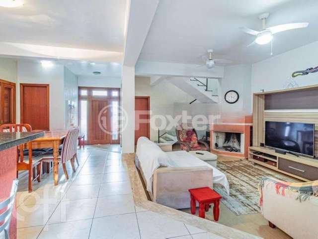 Casa com 4 quartos à venda na Avenida Vicente Monteggia, 2000, Cavalhada, Porto Alegre, 280 m2 por R$ 1.200.000