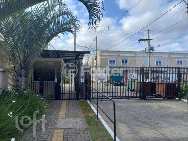 Casa em condomínio fechado com 2 quartos à venda na Rua Capitão Pedroso, 416, Restinga, Porto Alegre, 84 m2 por R$ 225.000