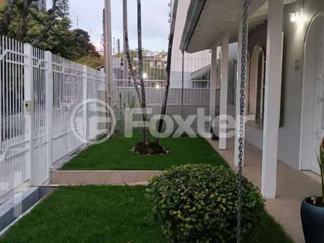 Casa com 4 quartos à venda na Rua Santo André, 86, Marechal Rondon, Canoas, 208 m2 por R$ 1.130.000