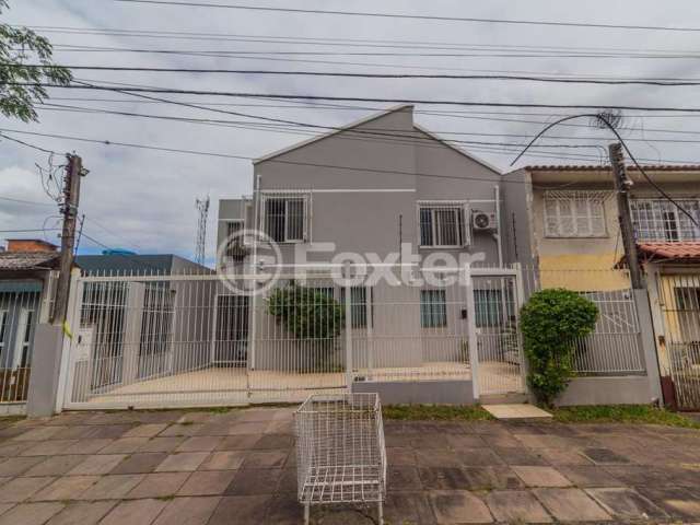 Casa com 3 quartos à venda na Rua Márcio Dias, 480, Nonoai, Porto Alegre, 230 m2 por R$ 1.450.000