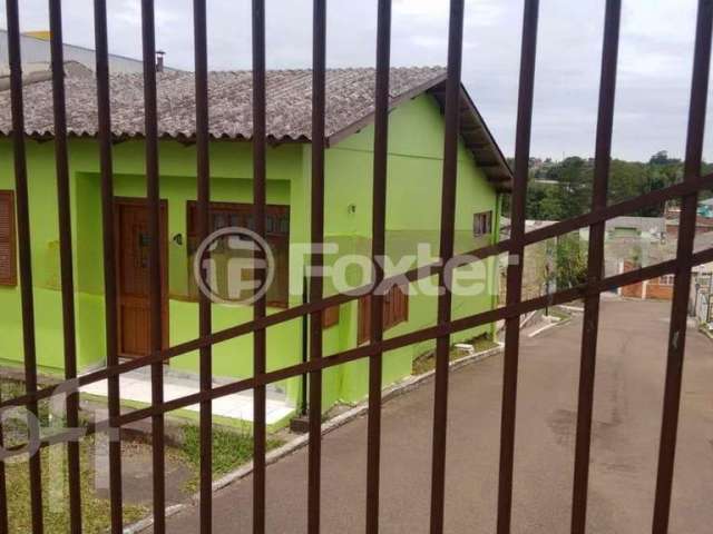 Casa em condomínio fechado com 2 quartos à venda na Rua Vinte e Cinco de Julho, 541, Barnabé, Gravataí, 48 m2 por R$ 225.000