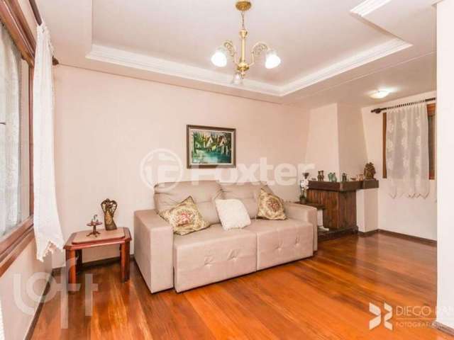 Casa com 3 quartos à venda na Rua Márcio Dias, 196, Nonoai, Porto Alegre, 214 m2 por R$ 850.000