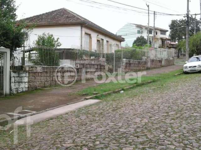 Casa com 6 quartos à venda na Avenida São Borja, 416, Nonoai, Porto Alegre, 538 m2 por R$ 850.000