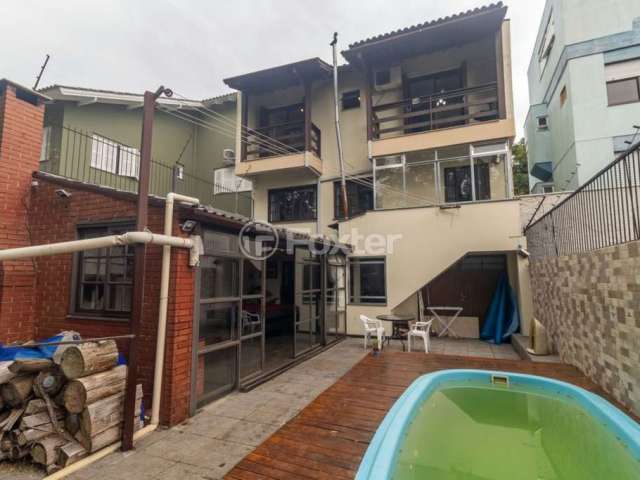 Casa com 4 quartos à venda na Rua Joaquim Cruz, 30, Santo Antônio, Porto Alegre, 256 m2 por R$ 1.150.000