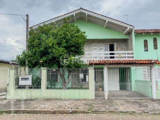 Casa com 4 quartos à venda na Rua Padre Leo Seibel, 119, Passo das Pedras, Porto Alegre, 369 m2 por R$ 427.000