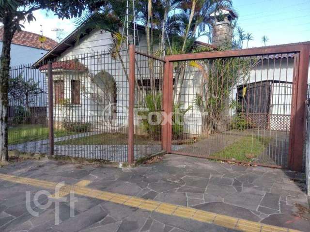 Casa com 4 quartos à venda na Rua Guilherme Schell, 192, Santo Antônio, Porto Alegre, 330 m2 por R$ 600.000