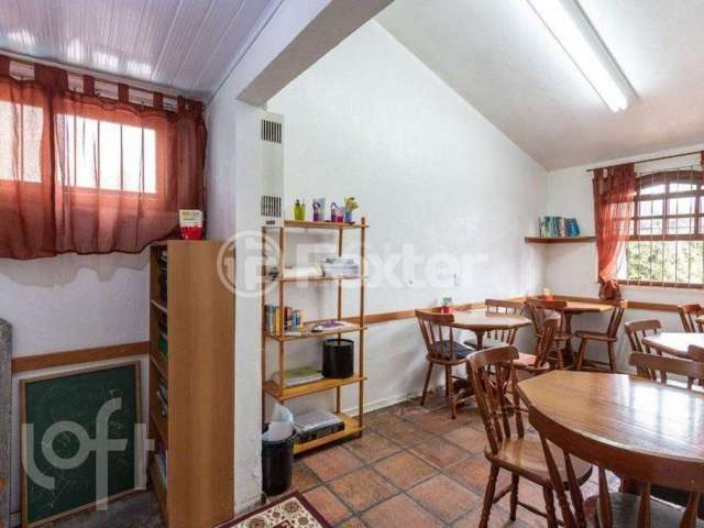 Casa com 3 quartos à venda na Rua Padre João Batista Reus, 919, Vila Conceição, Porto Alegre, 353 m2 por R$ 1.140.000