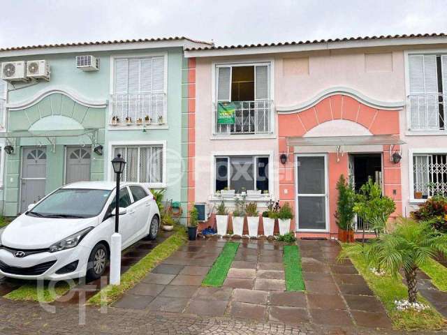 Casa em condomínio fechado com 3 quartos à venda na Avenida da Cavalhada, 5075, Cavalhada, Porto Alegre, 79 m2 por R$ 405.000