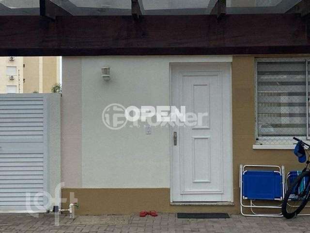Casa em condomínio fechado com 2 quartos à venda na Rua Aurora, 1200, Marechal Rondon, Canoas, 180 m2 por R$ 570.000