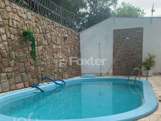 Casa com 3 quartos à venda na Rua Professora Antonieta de Barros, 813, Canto, Florianópolis, 345 m2 por R$ 1.650.000