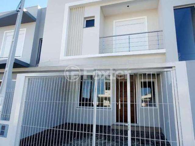 Casa com 3 quartos à venda na Rua Frei Henrique de Coimbra, 664, Nossa Senhora das Graças, Canoas, 142 m2 por R$ 595.000