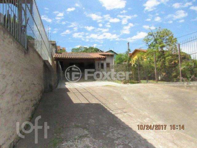 Casa com 3 quartos à venda na Avenida Vicente Monteggia, 2406, Cavalhada, Porto Alegre, 156 m2 por R$ 600.000