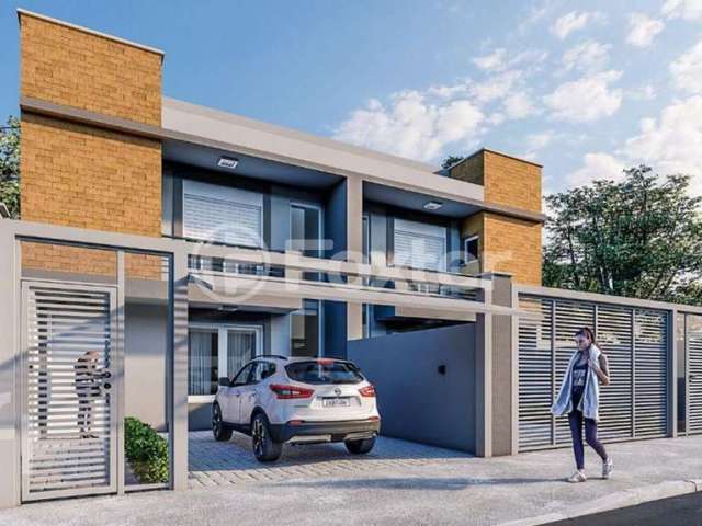 Casa com 3 quartos à venda na Rua Ilha Bela, 34, Estância Velha, Canoas, 262 m2 por R$ 950.000