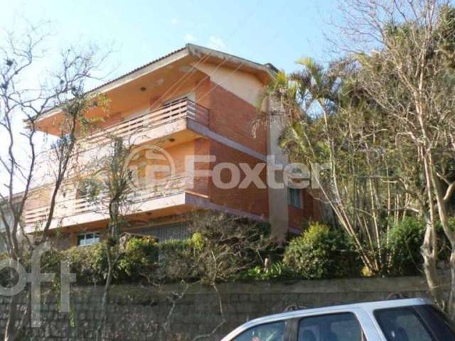 Casa com 4 quartos à venda na Rua Caeté, 1047, Vila Assunção, Porto Alegre, 323 m2 por R$ 1.800.000