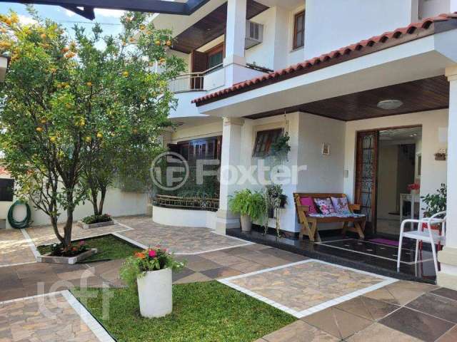 Casa com 6 quartos à venda na Rua Irmão Agnelo Chaves, 170, Marechal Rondon, Canoas, 448 m2 por R$ 1.730.000