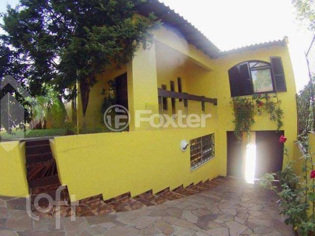 Casa com 3 quartos à venda na Rua Vinícius de Moraes, 174, Marechal Rondon, Canoas, 175 m2 por R$ 890.000