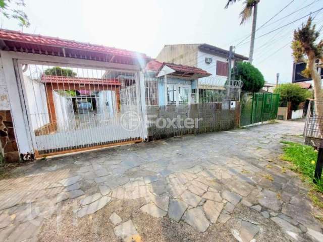 Casa com 3 quartos à venda na Rua Sebastião Wolf, 181, Nonoai, Porto Alegre, 180 m2 por R$ 868.900