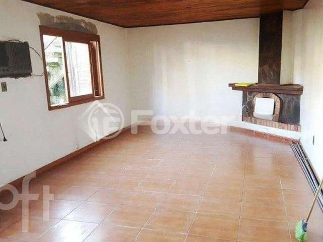 Casa com 3 quartos à venda na Rua Afonso Arinos, 858, Camaquã, Porto Alegre, 180 m2 por R$ 650.000