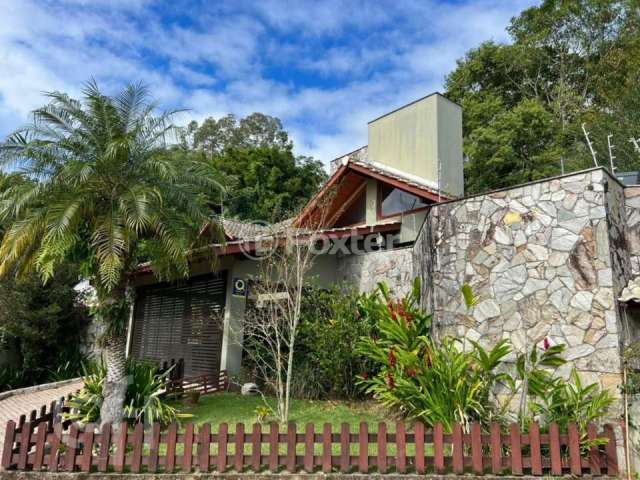 Casa com 3 quartos à venda na Rua Gilberto Pedro Hoffmann Nahas, 671, Pantanal, Florianópolis, 205 m2 por R$ 1.990.000