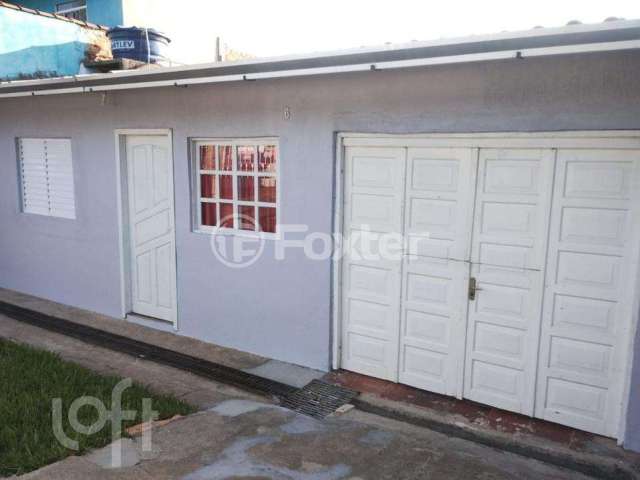 Casa com 3 quartos à venda na Rua Estados Unidos, 6, Guajuviras, Canoas, 120 m2 por R$ 240.000